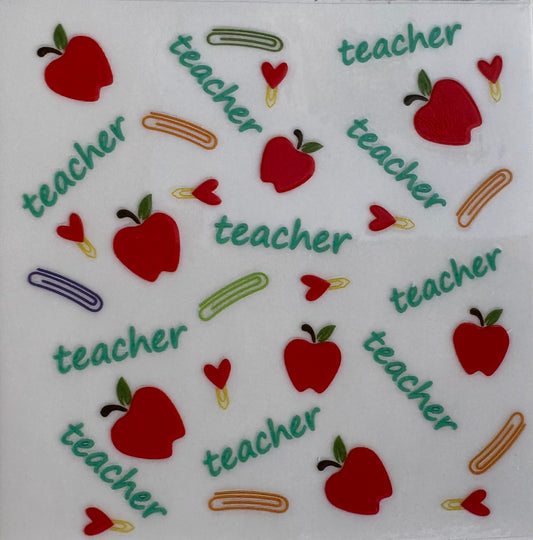 Teacher, Apples, and Paper Clips